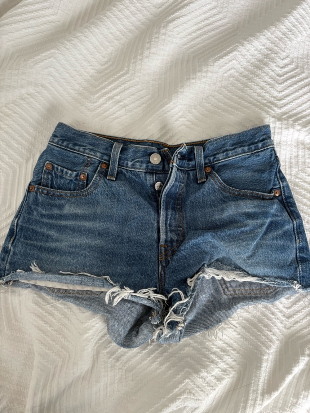 Levi's Distressed Mid-Blue Denim Cutoff Shorts